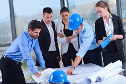 business people and construction engineers on meeting